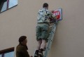 Foglarova ulice - Praha. Petr Bratsk� p�itlouk� ceduli. Foto